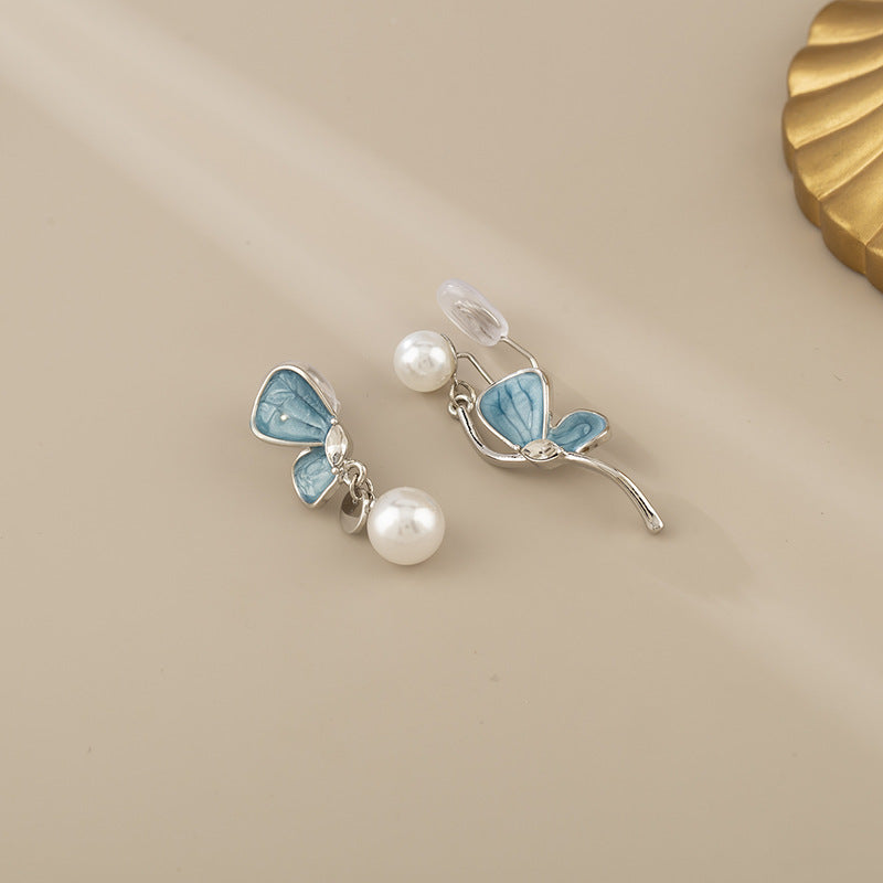 Asymmetrical Blue Butterfly Clip-On Earrings