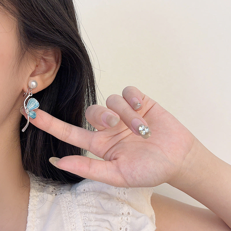 Asymmetrical Blue Butterfly Clip-On Earrings