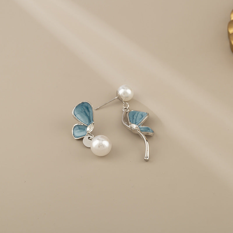 Asymmetrical Blue Butterfly Clip-On Earrings